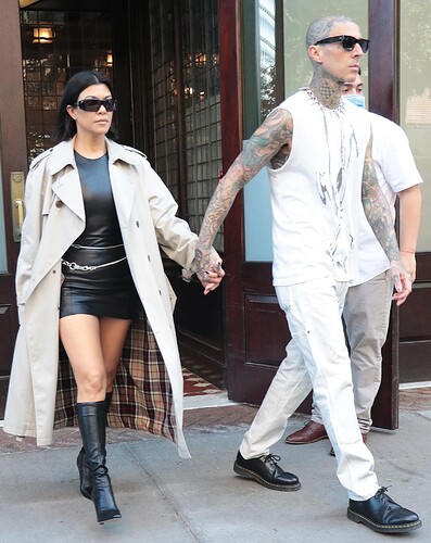 Kourtney-Kardashian-Travis-Barker-matching-black-white-outfit
