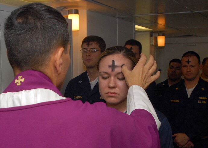 US_Navy_080206-N-7869M-057_Electronics_Technician_3rd_Class_Leila_Tardieu_receives_the_sacramental_ashes_during_an_Ash_Wednesday_celebration