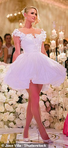 50410785-10193829-Four_The_DJ_looked_ready_to_party_in_this_reception_mini_dress-a-234_1636775958068
